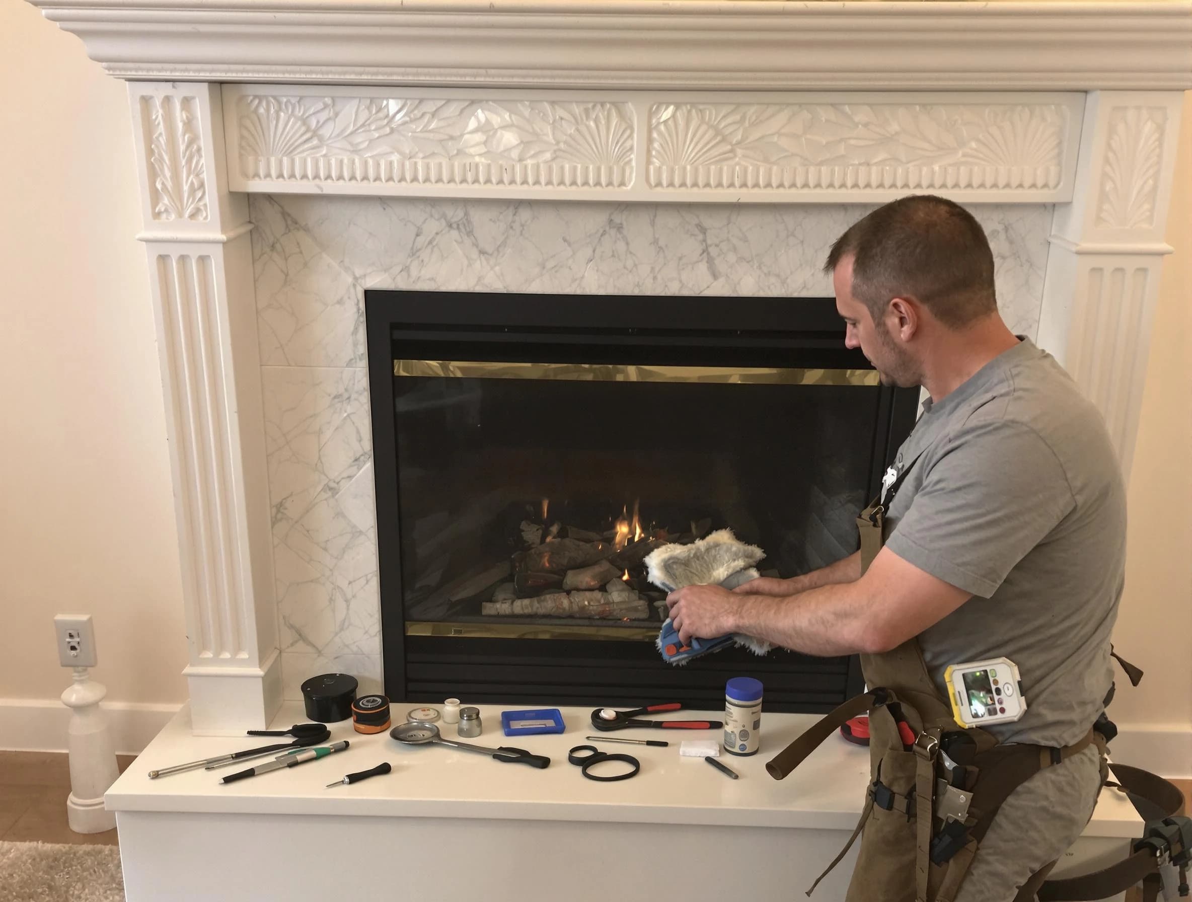Fort Lee Chimney Sweep performing fireplace maintenance in Fort Lee, VA